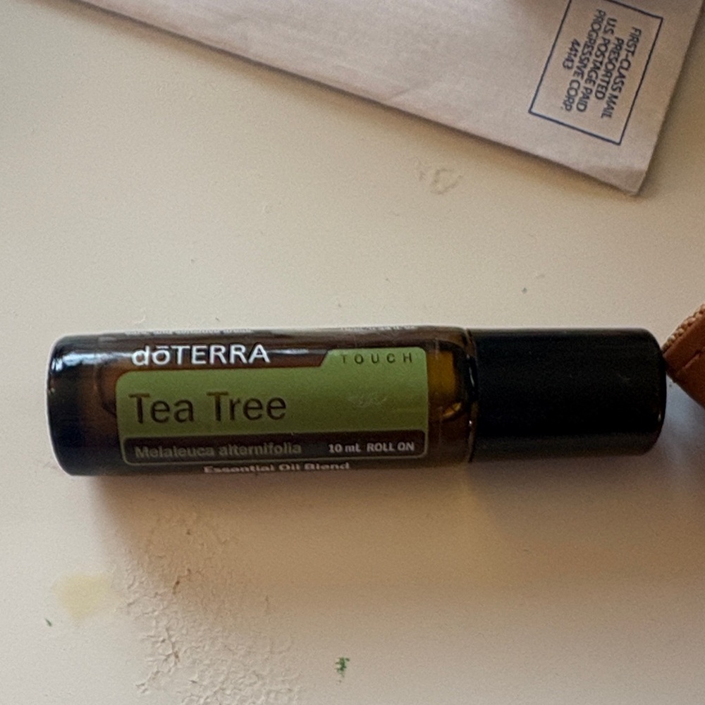 Doterra Tea Tree Touch Roll-On with Green Label and Black Cap